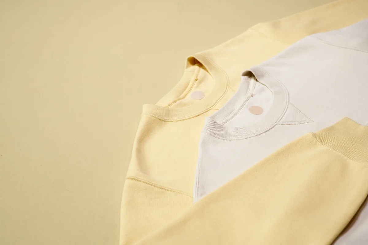 Representative detail image — Blank crewnecks — collar & raglan construction
