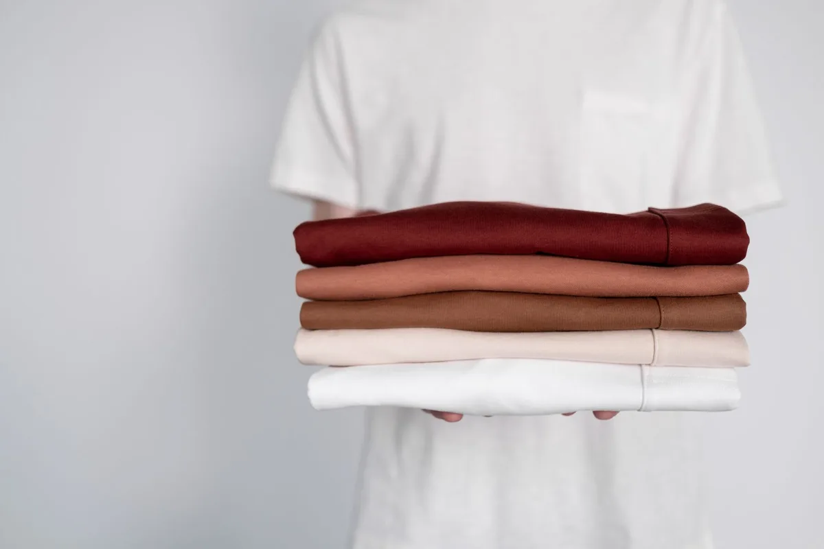 A stack of folded finished tees